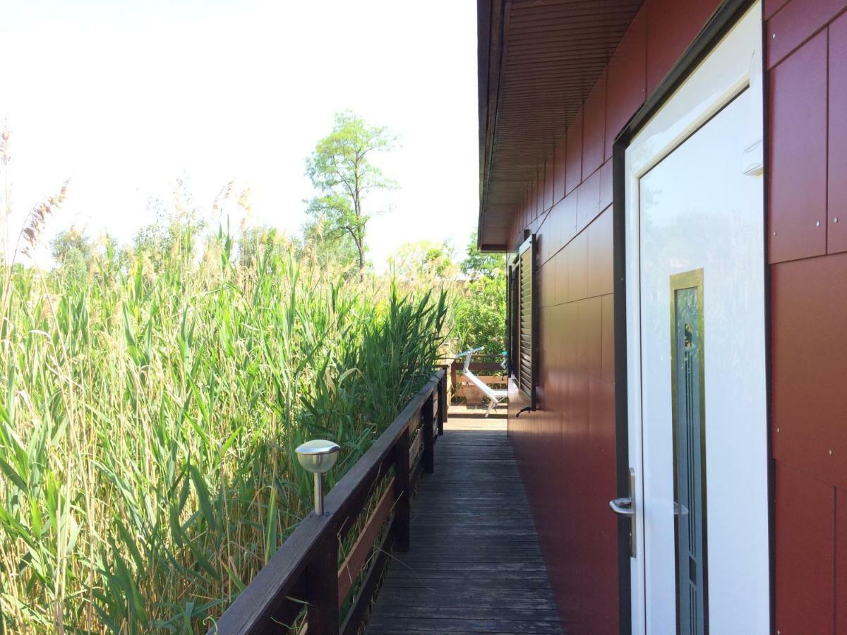 Pfahlbau In Weiden Am See Extérieur photo